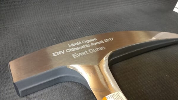 Engraved hammer The head of a hammer engraved with fine print using diamond cutter engraving.
