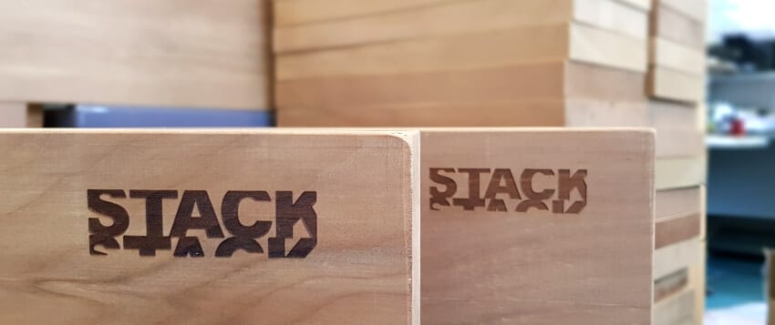 Laser engraving Two wood blocks displaying unique dark and lighter shades of laser engraving.